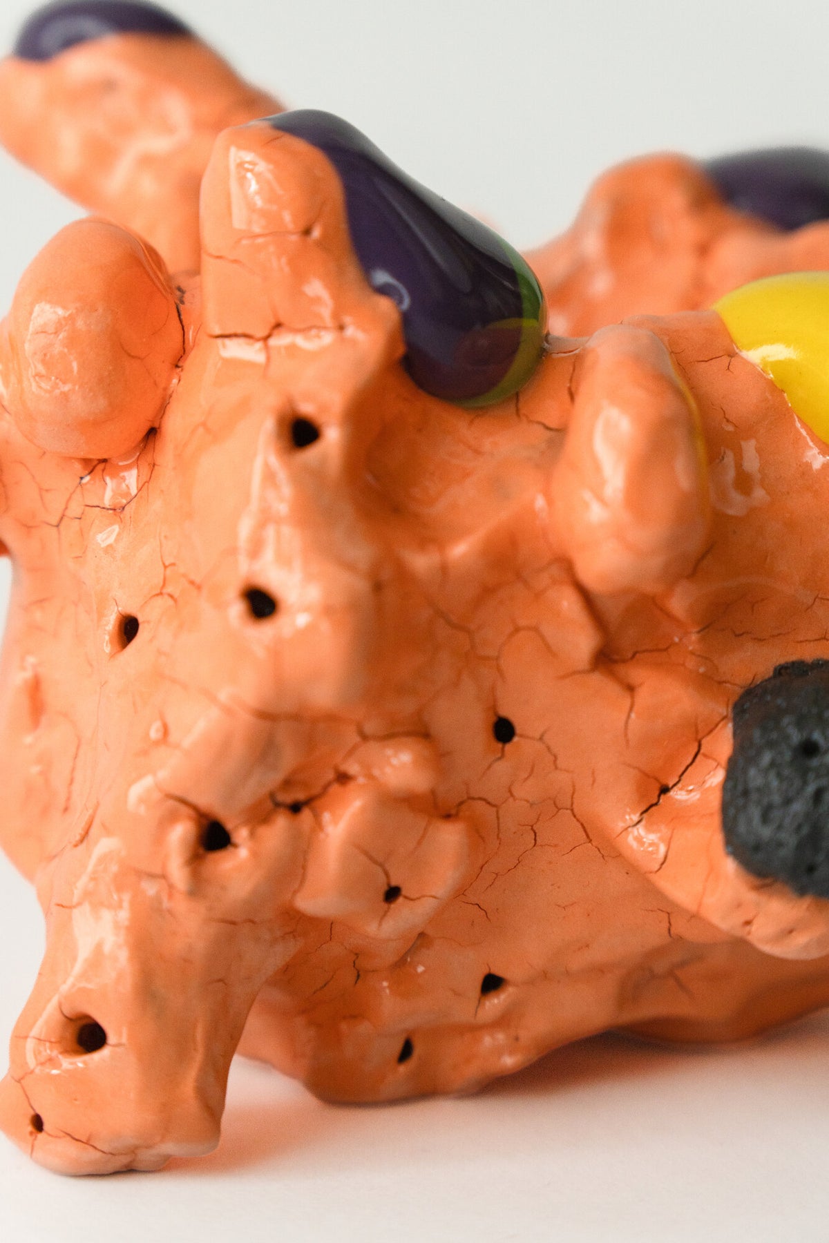 Foam #7 by Onree: Compact orange ceramic form with dark textured projections and yellow accents — additional view 2
