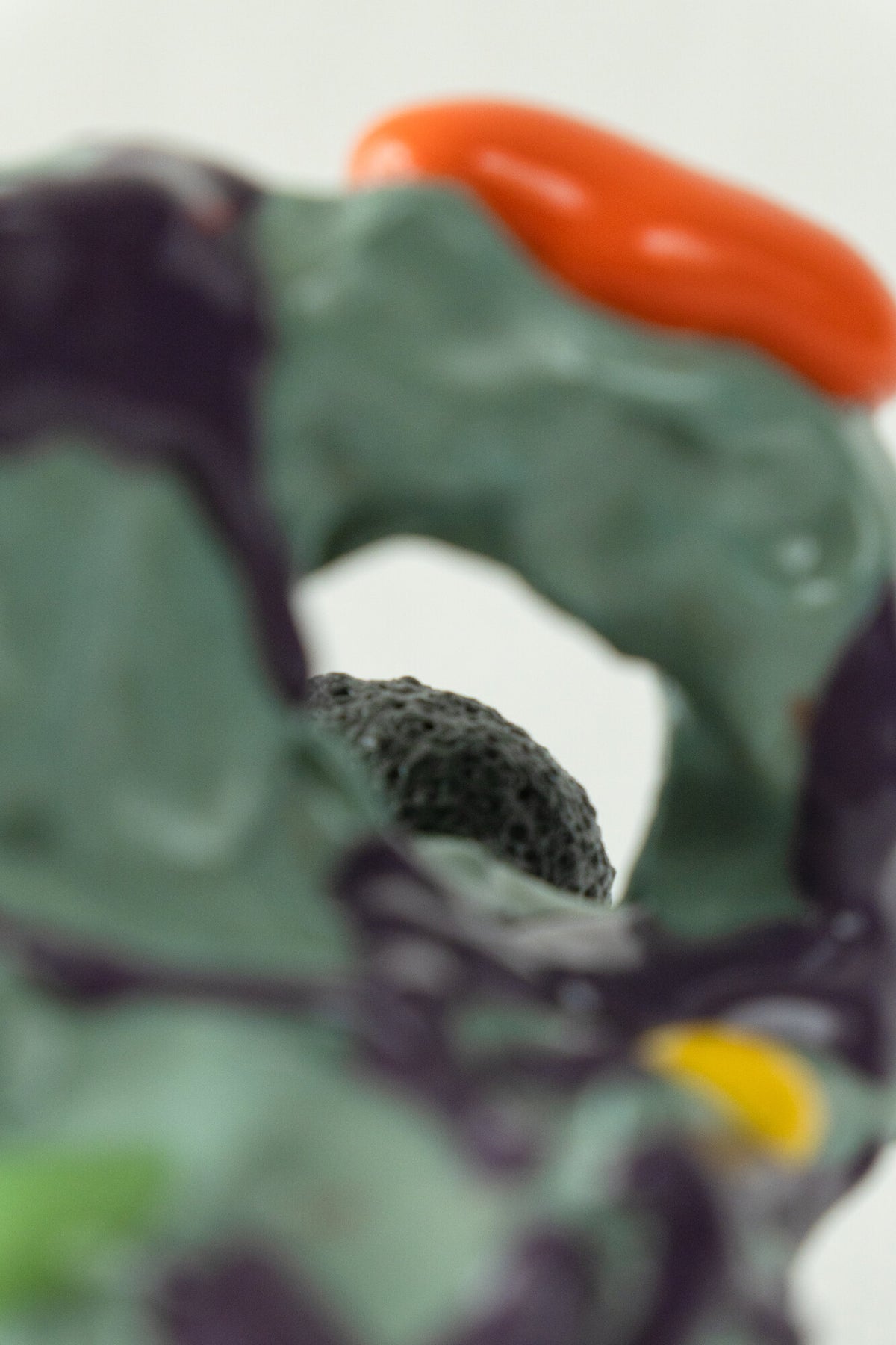 Foam #27 by Onree: Pale green ceramic vessel with deep openings, purple glaze and red marks — additional view 2