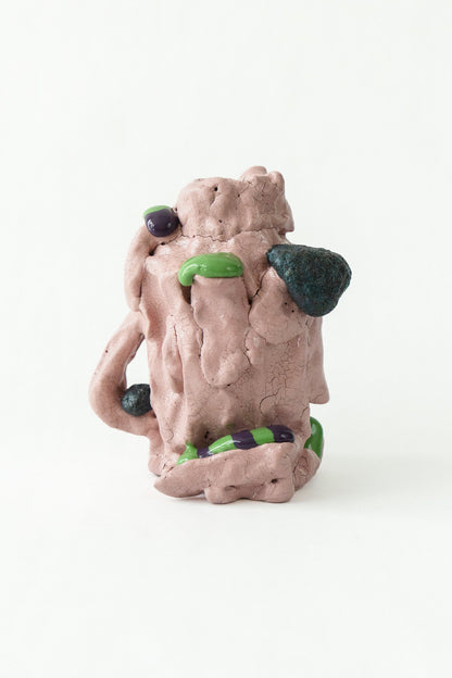 Foam #3 by Onree: Pink ceramic vessel with a folded surface and green and purple accents — full view