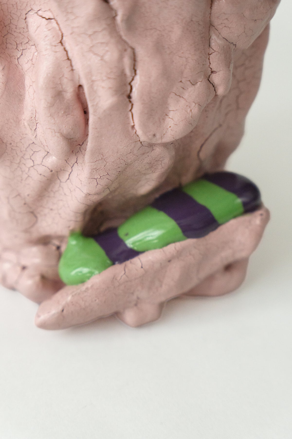 Foam #3 by Onree: Pink ceramic vessel with a folded surface and green and purple accents — additional view 2