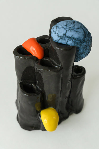 Foam #5 by Onree: Glossy black ceramic tubes with orange and yellow details and a textured blue disc — additional view 1