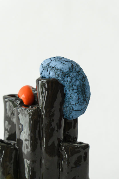 Foam #5 by Onree: Glossy black ceramic tubes with orange and yellow details and a textured blue disc — additional view 2