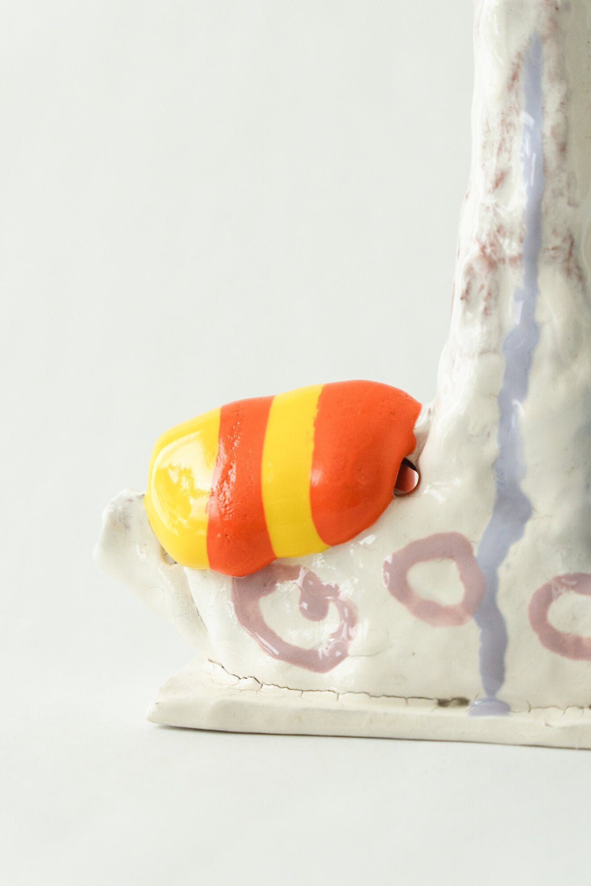 Foam #11 by Onree: Cream ceramic spire with pink circles, an orange-and-yellow striped detail, and a blue disc — additional view 1