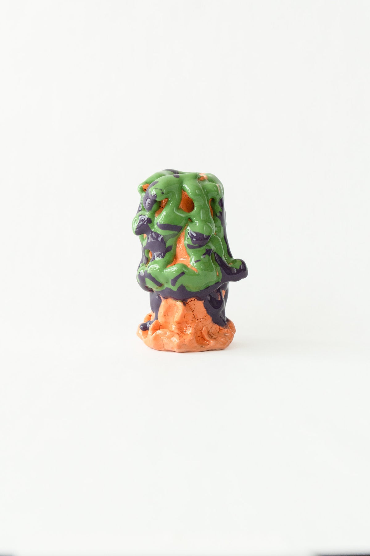 Foam #14 by Onree: Upright green and purple ceramic form on an orange base — full view