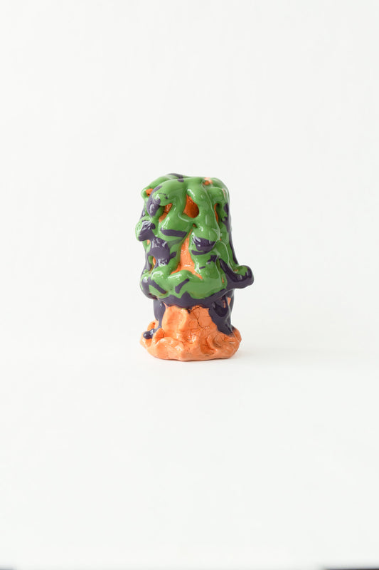 Foam #14 by Onree: Upright green and purple ceramic form on an orange base — full view