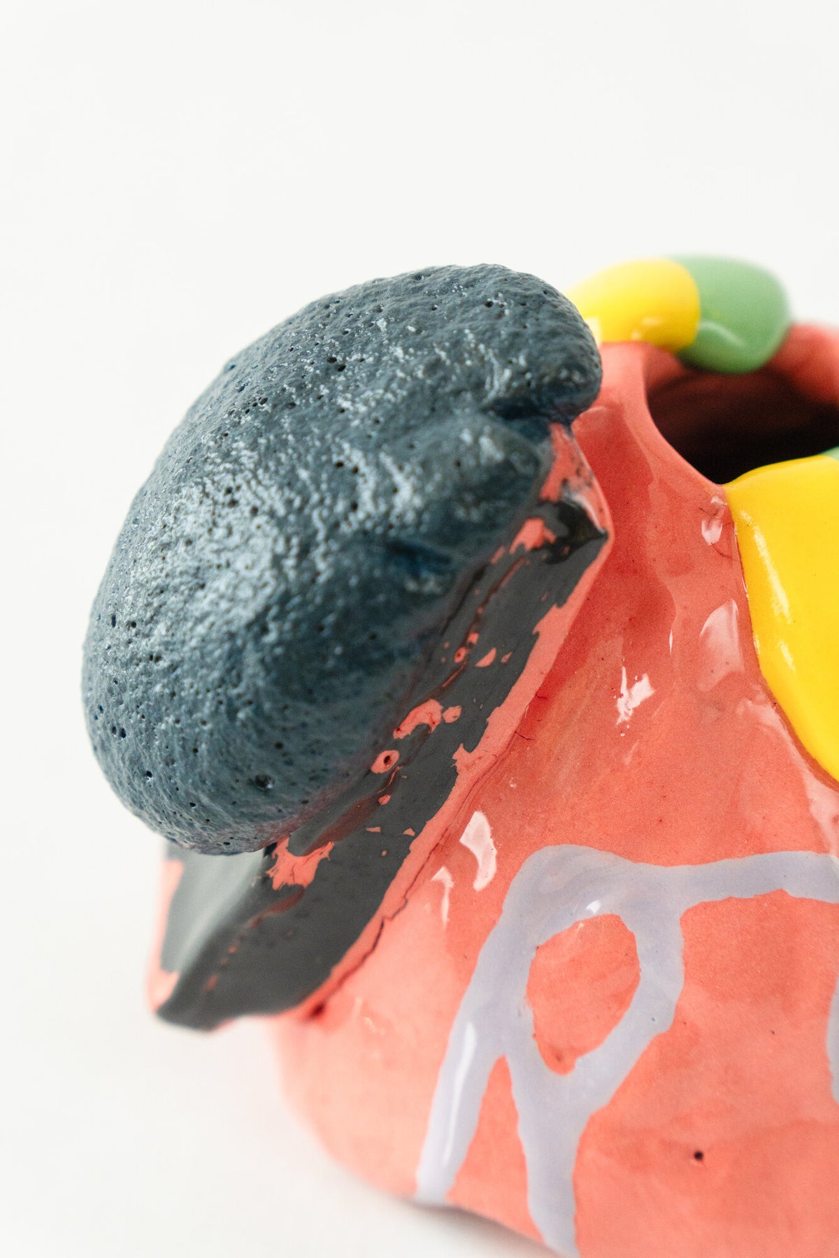Foam #18 by Onree: Coral ceramic vessel with lavender marks, a dark textured detail and yellow and green glaze — additional view 1