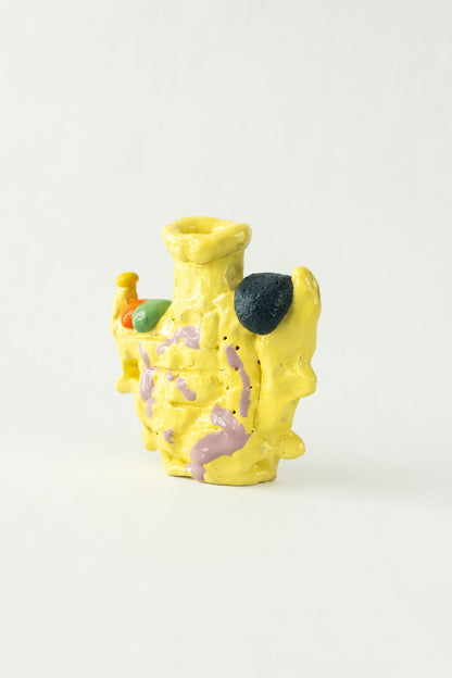 Foam #22 by Onree: Upright yellow ceramic vessel with lavender marks and contrasting raised details — full view