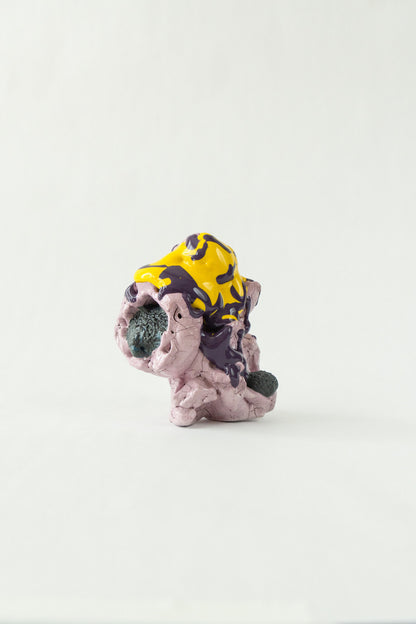 Foam #26 by Onree: Pale lavender ceramic form with yellow and purple glaze and dark textured additions — full view