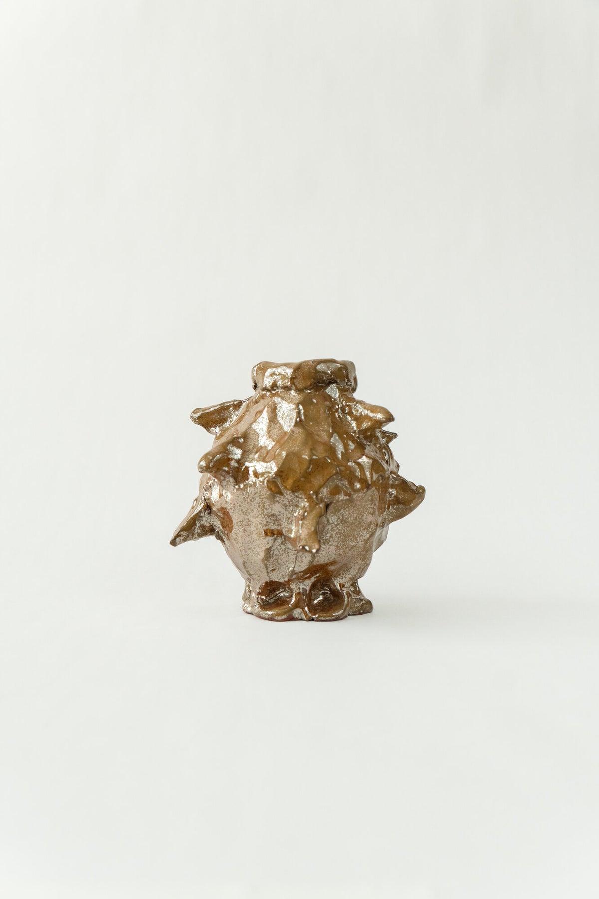Foam #28 by Onree: Brown ceramic vessel with irregular pointed folds and pale glaze — full view