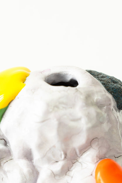 Foam #29 by Onree: Low white ceramic form with green, yellow and orange glaze and a dark textured detail — additional view 3