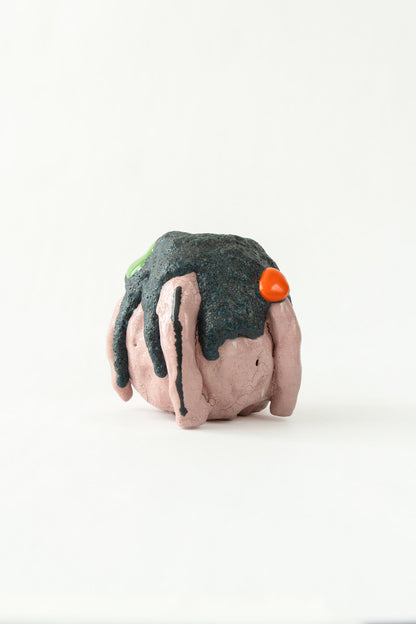 Foam #30 by Onree: Rounded pink ceramic vessel with a dark textured surface and long pink strips — full view
