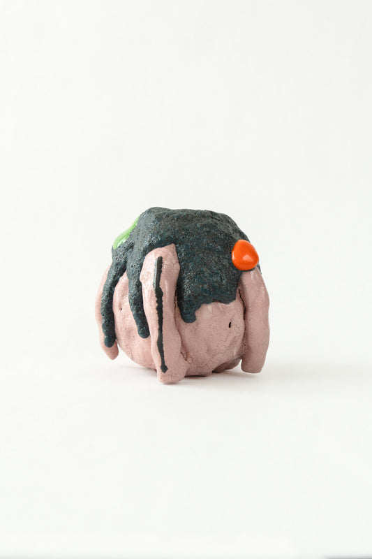 Foam #30 by Onree: Rounded pink ceramic vessel with a dark textured surface and long pink strips — full view
