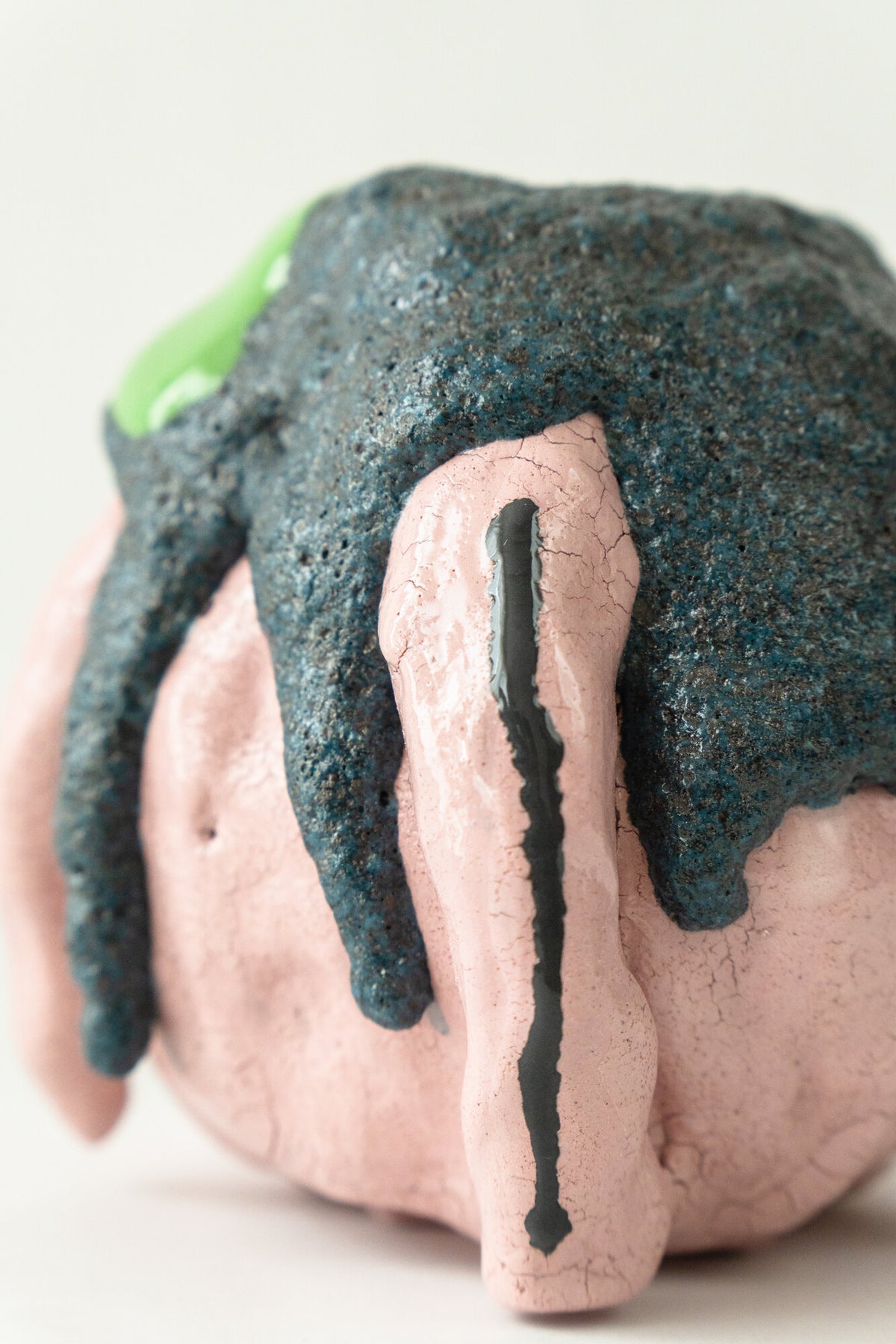 Foam #30 by Onree: Rounded pink ceramic vessel with a dark textured surface and long pink strips — additional view 2