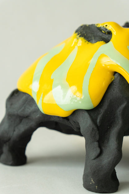 Foam #31 by Onree: Low black ceramic form with yellow, pale green and purple glaze — additional view 3