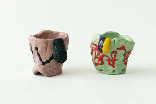 Memory Foam ochoko sake cups by Onree, showing different colours and irregular forms — full view